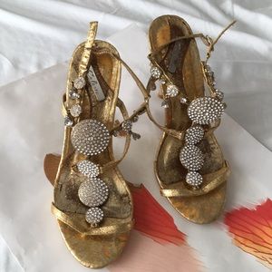 Gold strapped heels